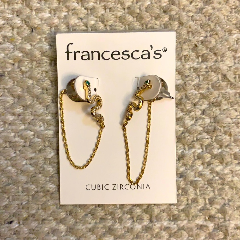 Francesca’s gold and gemstone snake earrings